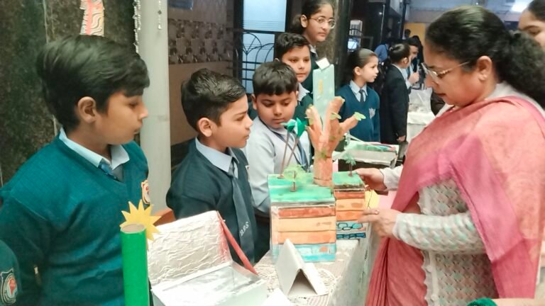 Students demonstrating a project at the Science Exhibition