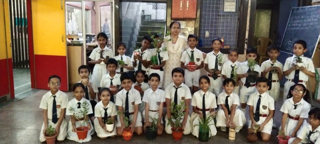 Students taking part in a tree plantation drive
